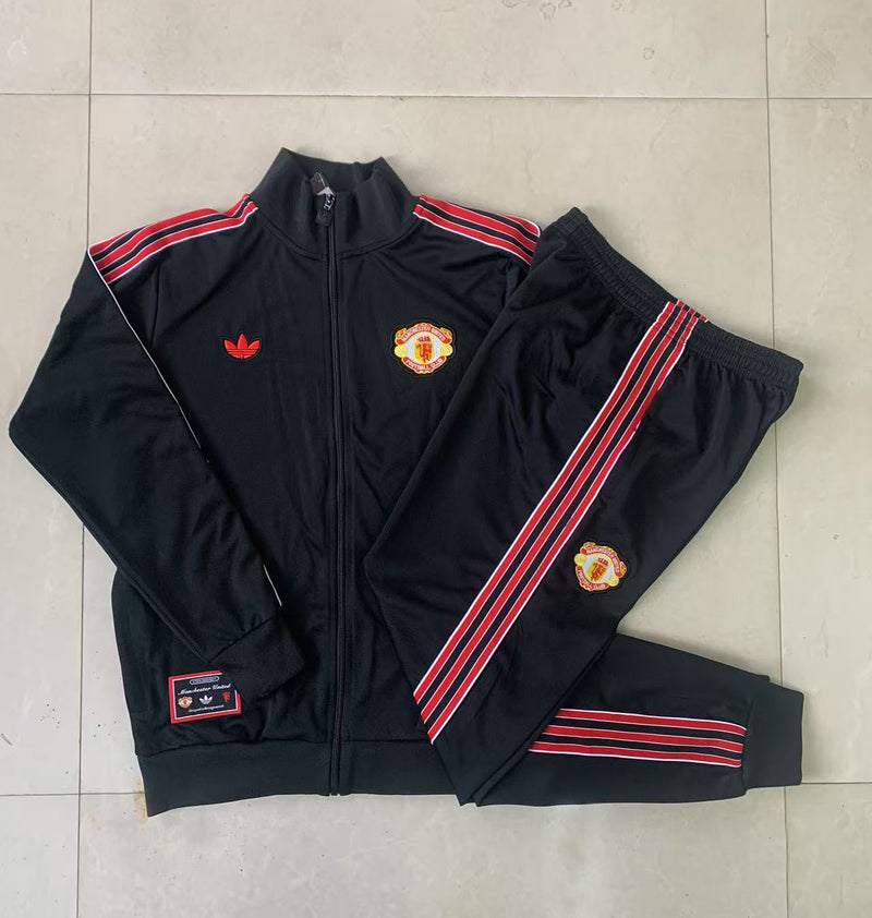 PANTALONI + FELPA MANCHESTER UNITED I 24/25 
